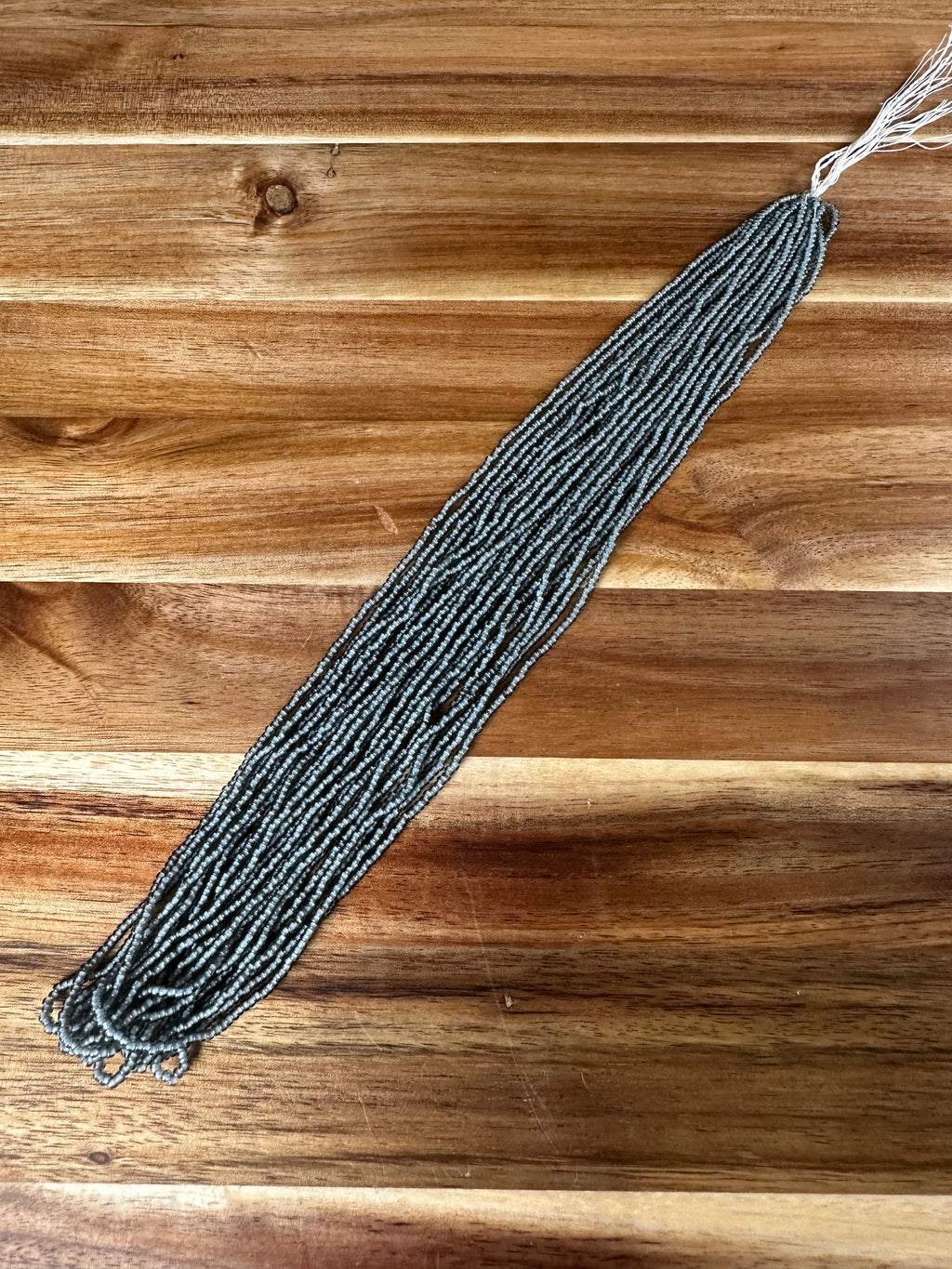 Czech Strung Glass Seed Bead - 11/0 Op TR Grey White Heart