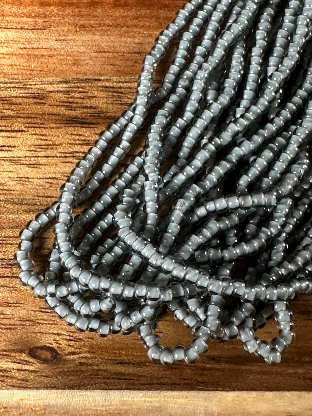 Czech Strung Glass Seed Bead - 11/0 Op TR Grey White Heart