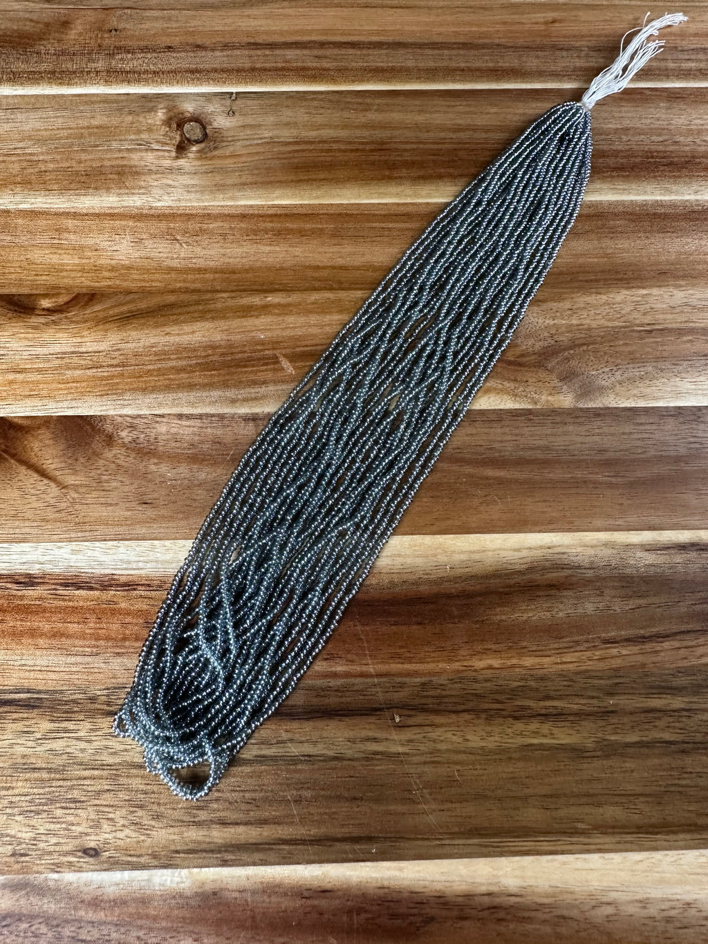 Czech Strung Glass Seed Bead - 11/0 Op TR Gunmetal