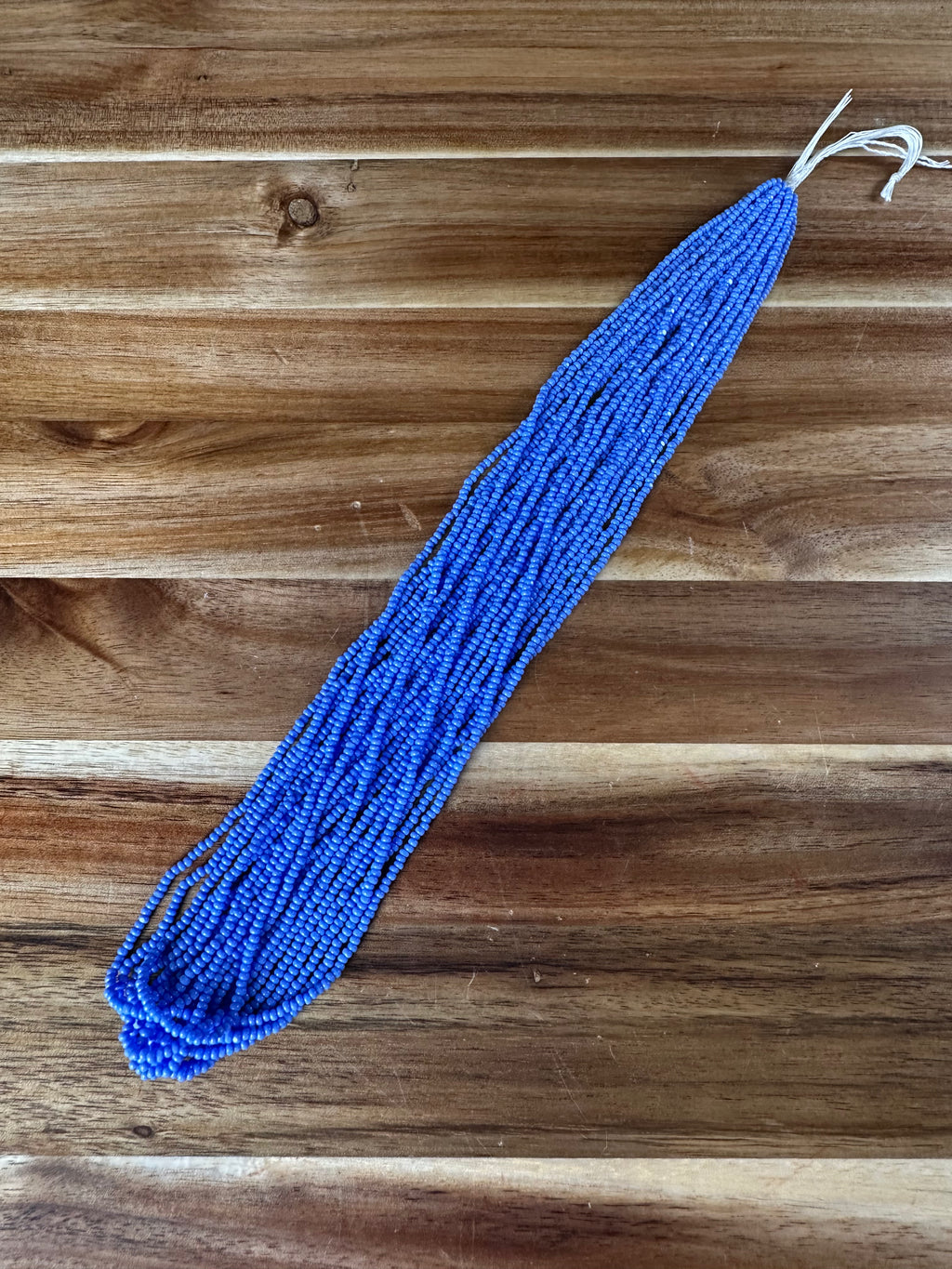 11/0 True Cut Op Light Oily Blue