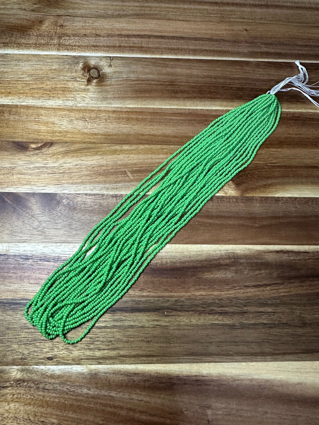 Czech Strung Glass Seed Bead - 11/0 Op Medium Green