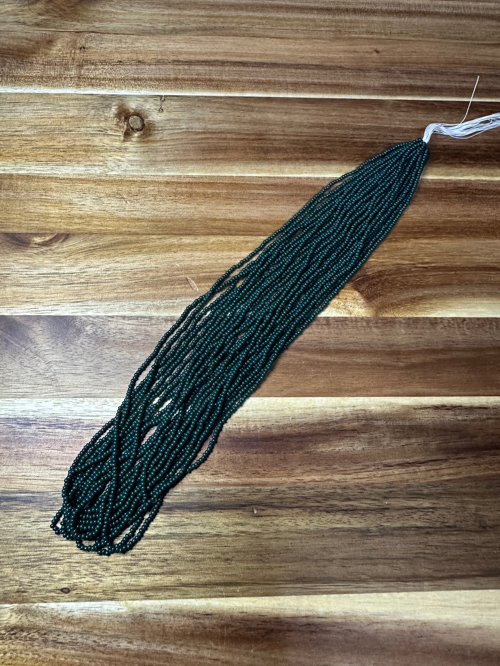 Czech Strung Glass Seed Bead - 11/0 Op Midnight Green