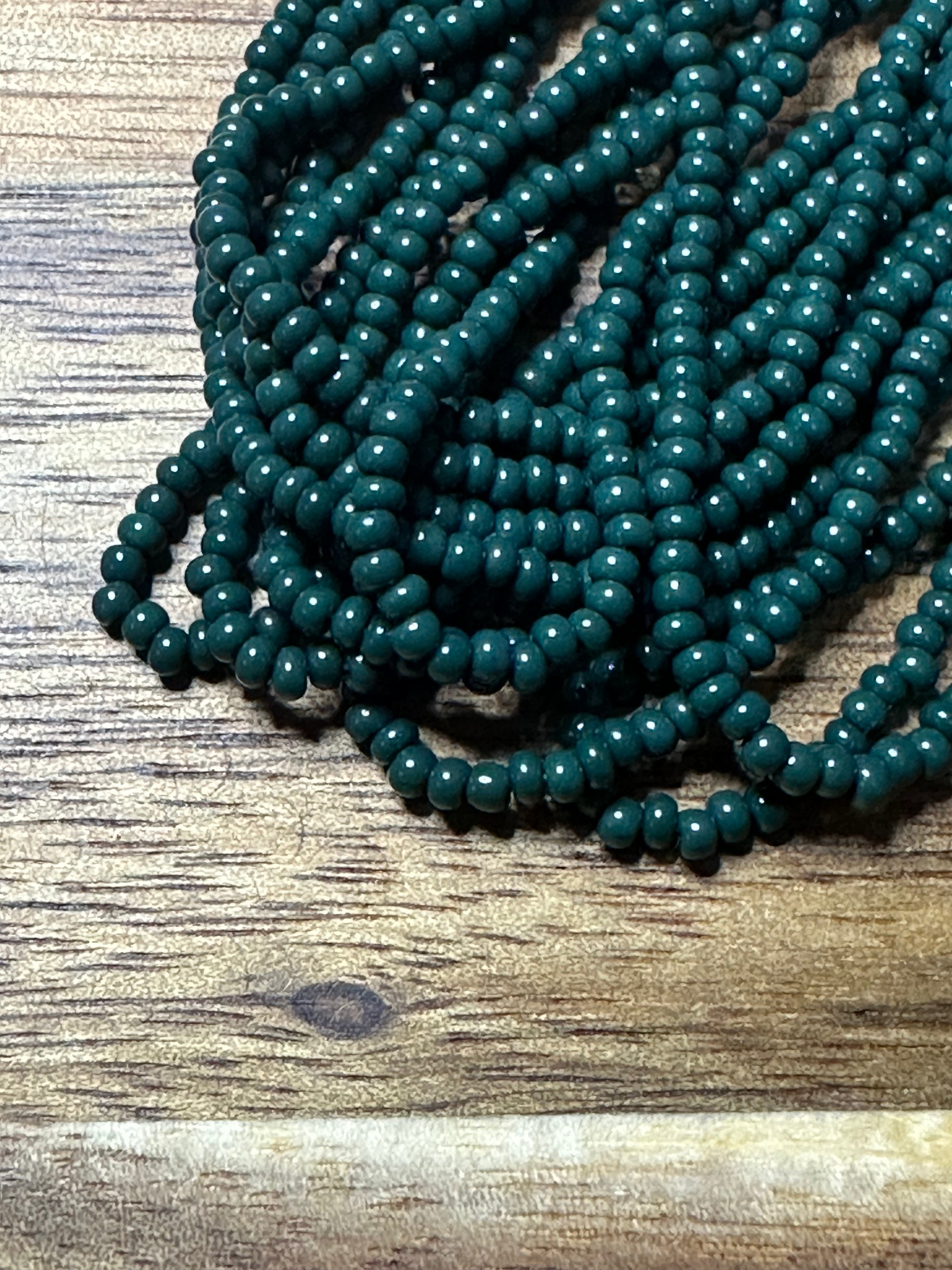 Czech Strung Glass Seed Bead - 11/0 Op Midnight Green