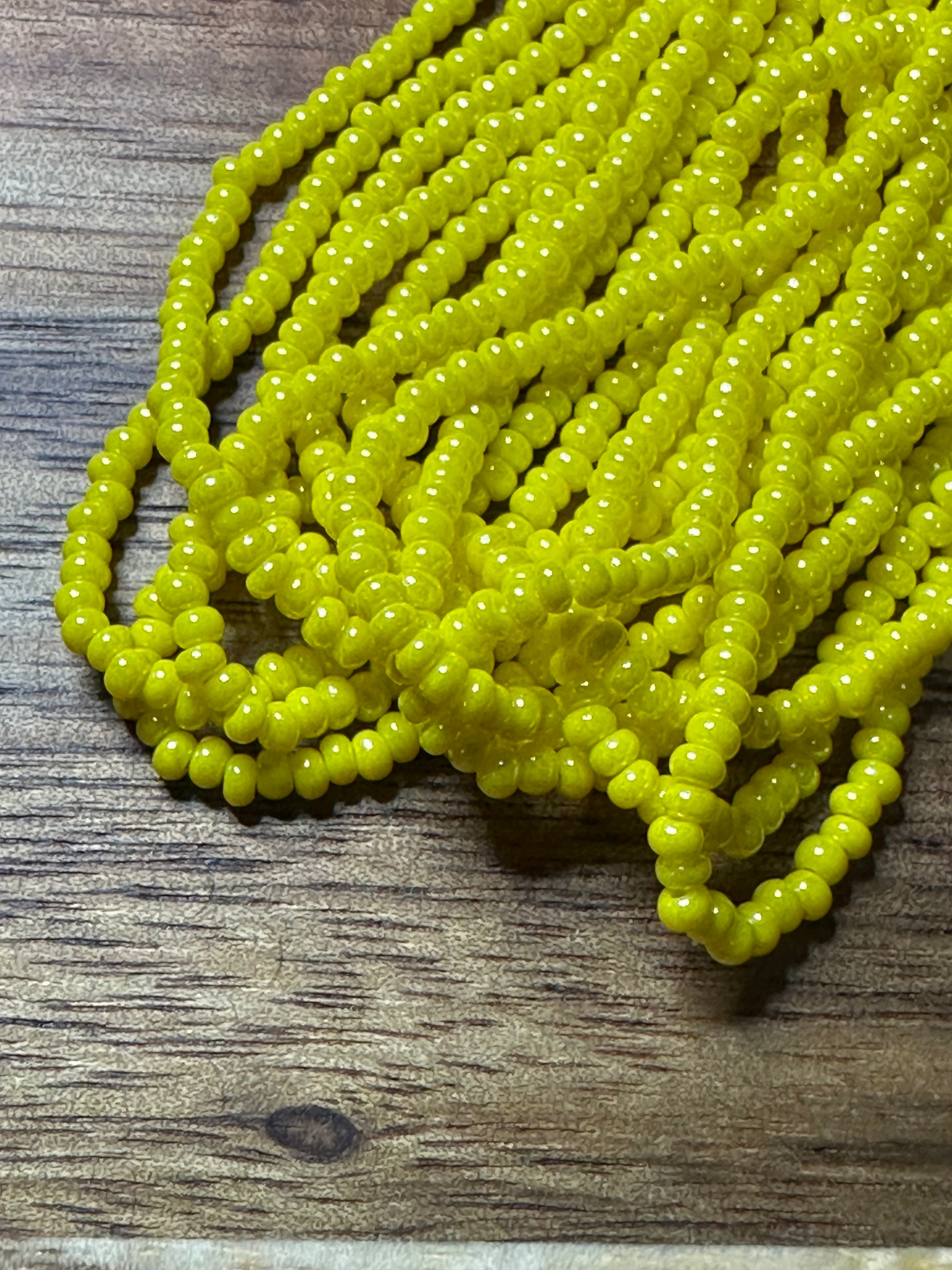 Czech Strung Glass Seed Bead - 11/0 Op Luster Yellow