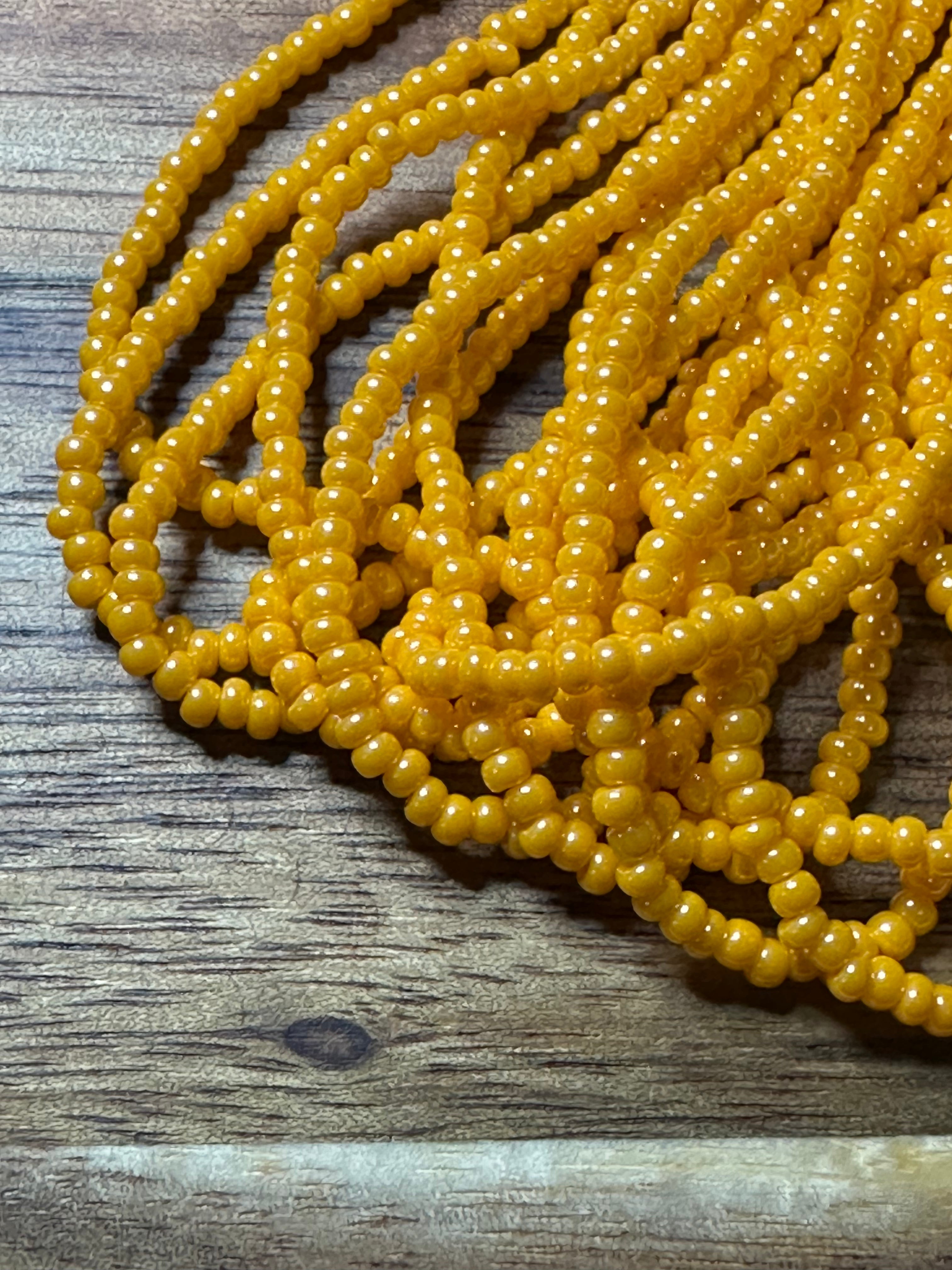 Czech Strung Glass Seed Bead - 11/0 Op Luster Light Orange